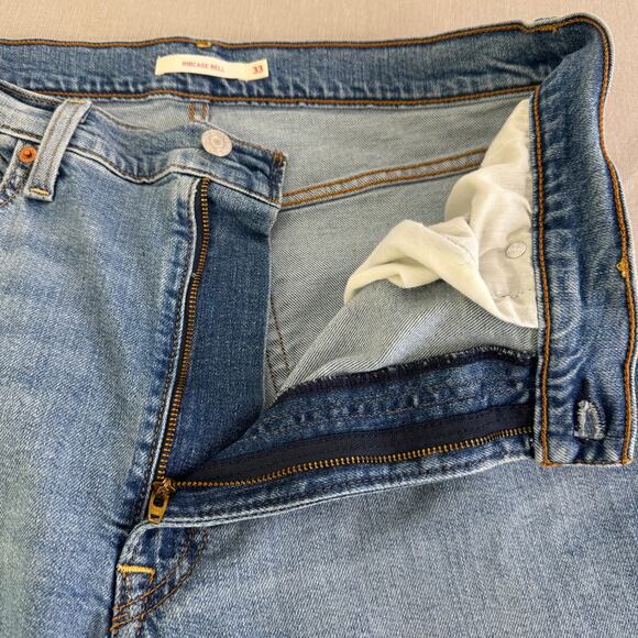 Levi's Ribcage Bell Jeans blown out knee Womens Size 33 - Picture 7 of 14